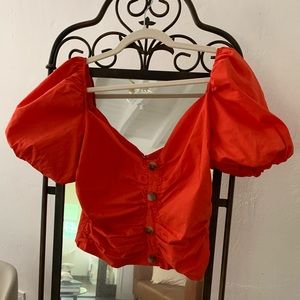 Orange blouse w/ bubble sleeves and buttons
